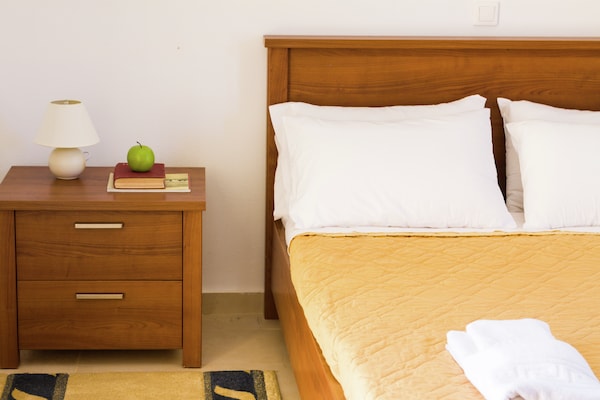Foto van Villa privézwembad, tegen berghelling, met fantastisch uitzicht op baai van Bali - BedRoom