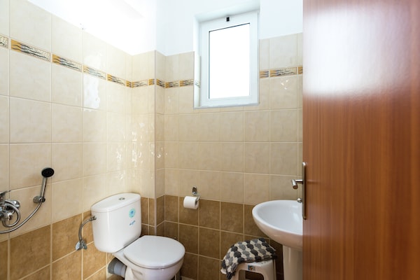 Foto van Villa privézwembad, tegen berghelling, met fantastisch uitzicht op baai van Bali - BathRoom