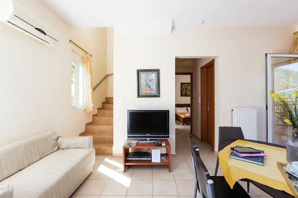 Foto van Villa privézwembad, tegen berghelling, met fantastisch uitzicht op baai van Bali - LivingRoom