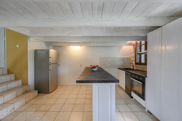 Foto van Villa in Spili met Uitzicht & Zwembad - Vakantiehuis in Lampini - Kitchen