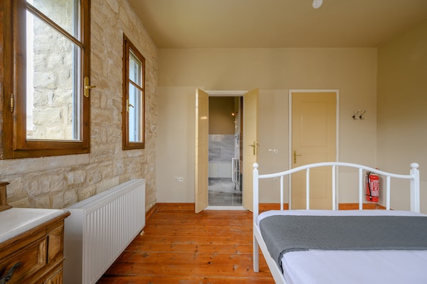 Foto van Villa in Spili met Uitzicht & Zwembad - Vakantiehuis in Lampini - BedRoom