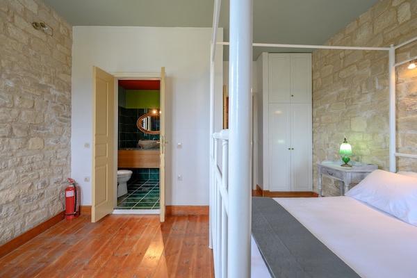 Foto van Villa in Spili met Uitzicht & Zwembad - Vakantiehuis in Lampini - BedRoom