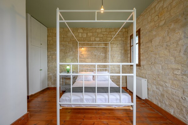 Foto van Villa in Spili met Uitzicht & Zwembad - Vakantiehuis in Lampini - BedRoom