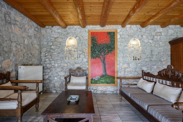 Foto van Villa op Kreta met privézwembad en bergzicht - Vakantiehuis in Lampini - LivingRoom