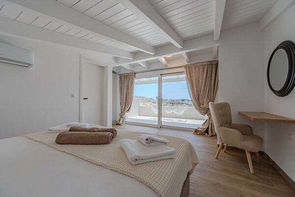 Foto van Villa in Damnoni met zwembad bij strand - Vakantiehuis in Damnoni - BedRoom