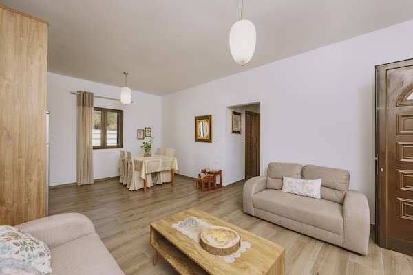 Foto van Villa in Panormo met Privézwembad & Strand - Vakantiehuis in Panormo - LivingRoom