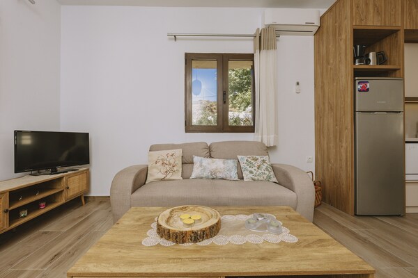 Foto van Villa in Panormo met Privézwembad & Strand - Vakantiehuis in Panormo - LivingRoom