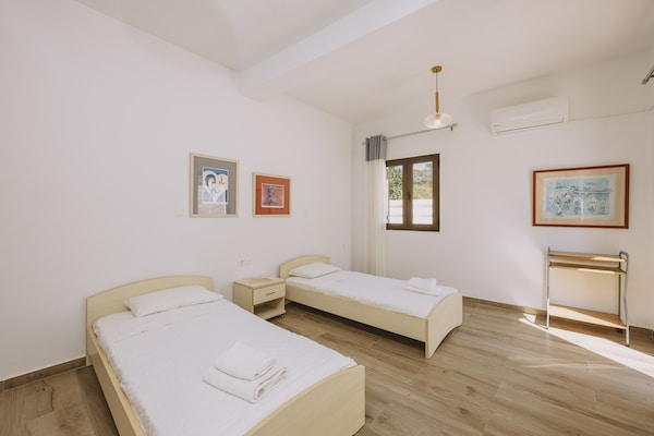 Foto van Villa in Panormo met Privézwembad & Strand - Vakantiehuis in Panormo - BedRoom