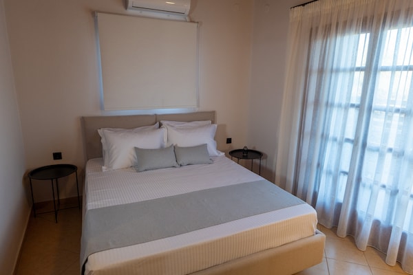 Foto van Villa in Panormo met Zwembad en Strand dichtbij - Vakantiehuis in Panormo - BedRoom