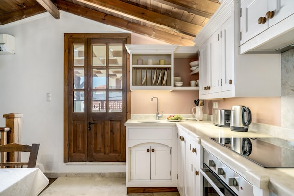 Foto van Villa met 5 slaapkamers en verwarmd zwembad - Vakantiehuis in Panormo - Kitchen