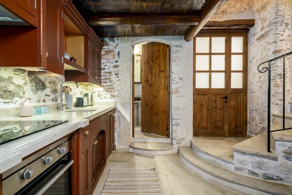 Foto van Villa met 5 slaapkamers en verwarmd zwembad - Vakantiehuis in Panormo - Kitchen