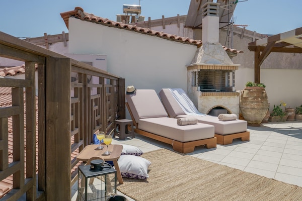 Foto van Villa met 5 slaapkamers en verwarmd zwembad - Vakantiehuis in Panormo - TerraceBalcony