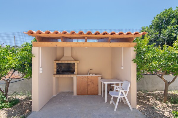 Foto van Villa in Adelianos Kampos bij zandstrand - Vakantiehuis in Adelianos Kampos - Outdoor