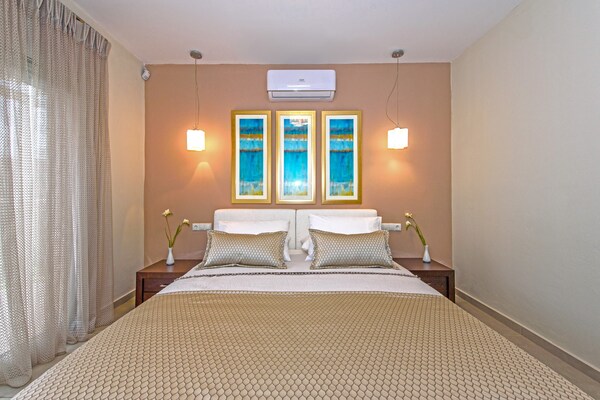 Foto van Villa in Gerani met privézwembad en zeezicht - Vakantiehuis in Gerani - BedRoom