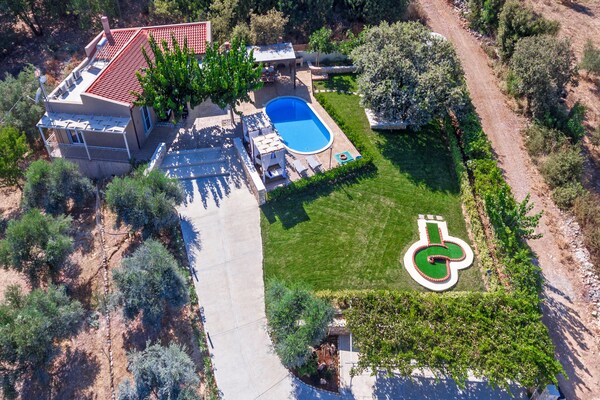 Foto van Villa in Gerani met privézwembad en zeezicht - Vakantiehuis in Gerani - Outdoor