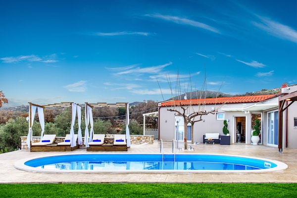 Foto van Villa in Gerani met privézwembad en zeezicht - Vakantiehuis in Gerani - Outdoor