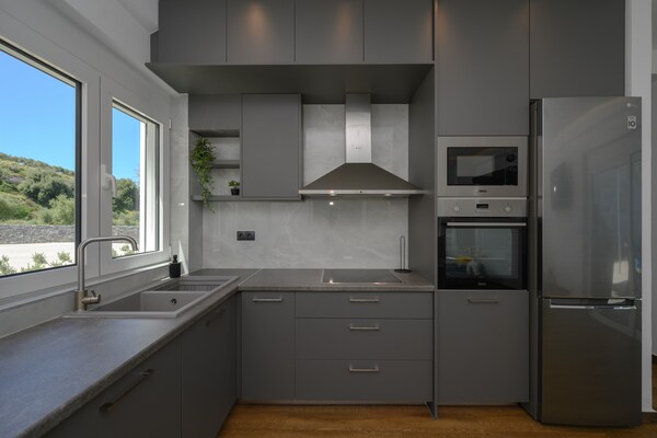 Foto van villa in Agia Triada heeft 2 slaapkamers - Vakantiehuis in Agia Triada - Kitchen