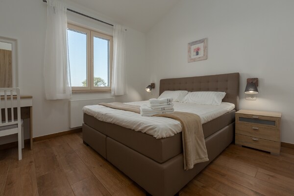 Foto van Villa in Deklici met Infinity Pool & Uitzicht - Vakantiehuis in Kaštelir - BedRoom