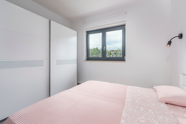 Foto van Villa in Novigrad met Privézwembad en Strand - Vakantiehuis in Novigrad - BedRoom