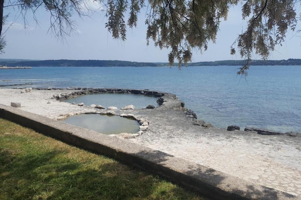 Foto van Villa in Novigrad met Privézwembad en Strand - Vakantiehuis in Novigrad - AreaSummer20KM