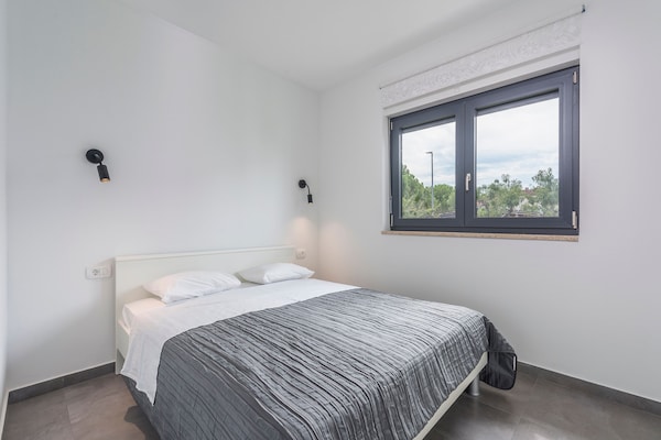 Foto van Villa in Novigrad met Privézwembad en Strand - Vakantiehuis in Novigrad - BedRoom