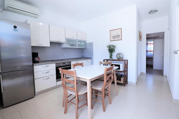 Foto van Appartement in Čiovo met groot balkon - Vakantiehuis in Okrug Gornji - Kitchen