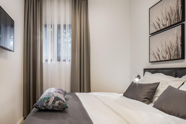 Foto van Luxe villa met zeezicht en verwarmd zwembad - Vakantiehuis in Kaštela - BedRoom