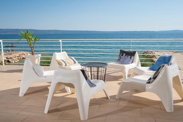 Foto van Villa aan het strand met bubbelbad - Vakantiehuis in Podstrana - TerraceBalcony