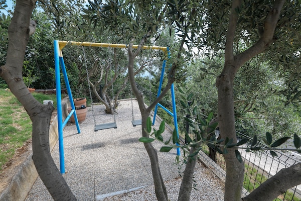 Foto van Luxe appartement met verwarmd zwembad in Starigrad - GardenSummer