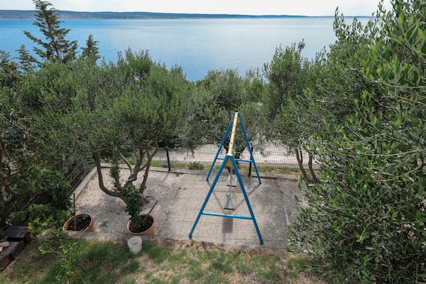 Foto van Luxe appartement met verwarmd zwembad in Starigrad - GardenSummer