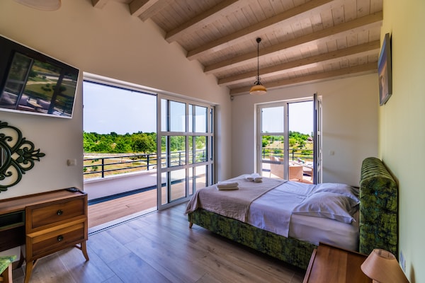 Foto van Villa in Filipana met verwarmd zwembad - Vakantiehuis in Filipana - BedRoom