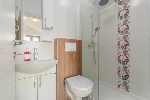 Foto van Villa in Skitaca met Zwembad en Zeezicht - Vakantiehuis in Koromačno - BathRoom