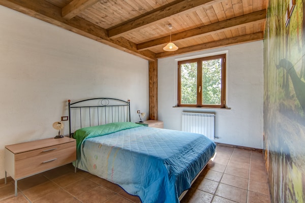 Foto van Zonnig vakantiehuis in Marche met een zwembad - Vakantiehuis in Serra Sant'abbondio - BedRoom