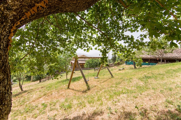 Foto van Zonnig vakantiehuis in Marche met een zwembad - Vakantiehuis in Serra Sant'abbondio - GardenSummer