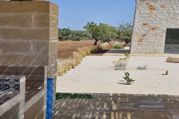 Foto van Villa in eeuwenoude olijfgaard - Vakantiehuis in Ostuni - ExteriorSummer