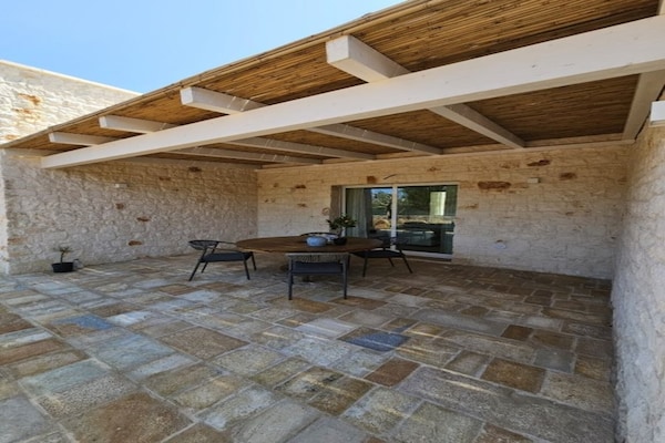 Foto van Villa in eeuwenoude olijfgaard - Vakantiehuis in Ostuni - TerraceBalcony