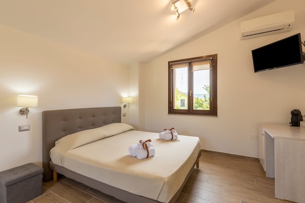 Foto van Appartement met exclusief zwembad - Vakantiehuis in Iglesias - BedRoom