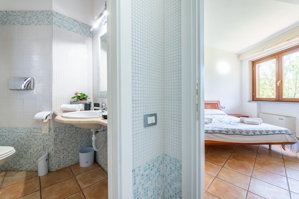 Foto van Villa met privézwembad Costa Rei - Vakantiehuis in Muravera Costa Rei - Landing