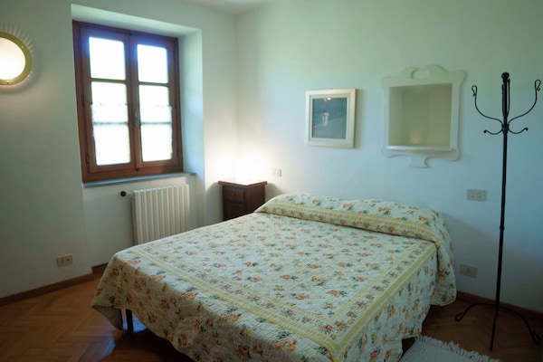 Foto van Villa in Casentino met zwembad en kasteelzicht - Vakantiehuis in Stia - BedRoom