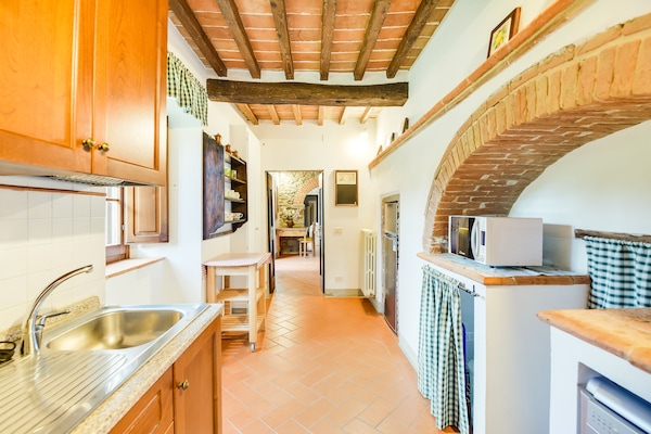 Foto van Villa in Toscane met Zwembad & Olijfbomen - Vakantiehuis in Cortona - Kitchen