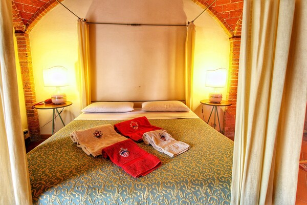 Foto van Panoramische Toscaanse villa - Vakantiehuis in Sinalunga - BedRoom