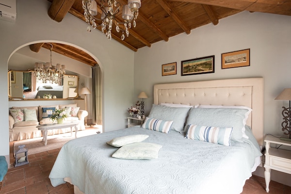 Foto van Boerderij in Toscaanse stijl in Capannori - Vakantiehuis in Capannori - BedRoom