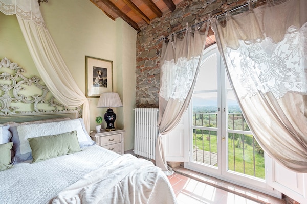 Foto van Boerderij in Toscaanse stijl in Capannori - Vakantiehuis in Capannori - BedRoom