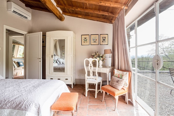 Foto van Boerderij in Toscaanse stijl in Capannori - Vakantiehuis in Capannori - BedRoom