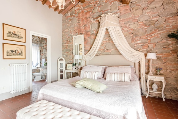 Foto van Boerderij in Toscaanse stijl in Capannori - Vakantiehuis in Capannori - BedRoom