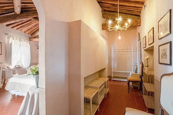 Foto van Boerderij in Toscaanse stijl in Capannori - Vakantiehuis in Capannori - BedRoom