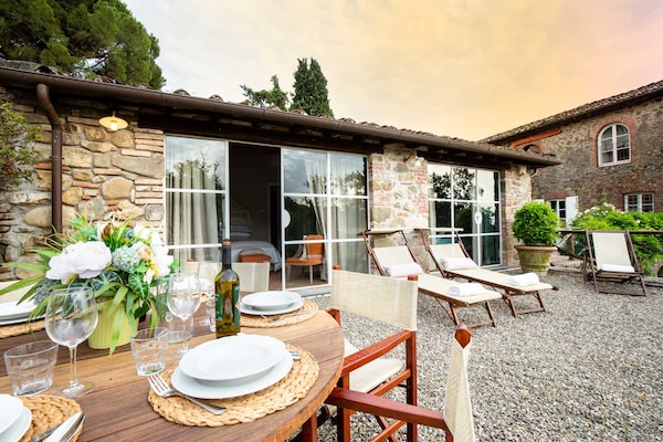 Foto van Boerderij in Toscaanse stijl in Capannori - Vakantiehuis in Capannori - TerraceBalcony