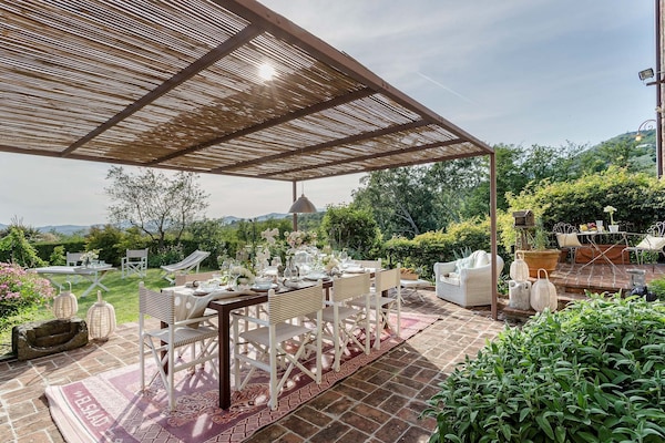 Foto van Boerderij in Toscaanse stijl in Capannori - Vakantiehuis in Capannori - TerraceBalcony