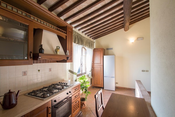 Foto van Huis in Toscane met zwembad - Vakantiehuis in Castel del Piano – GR - Kitchen