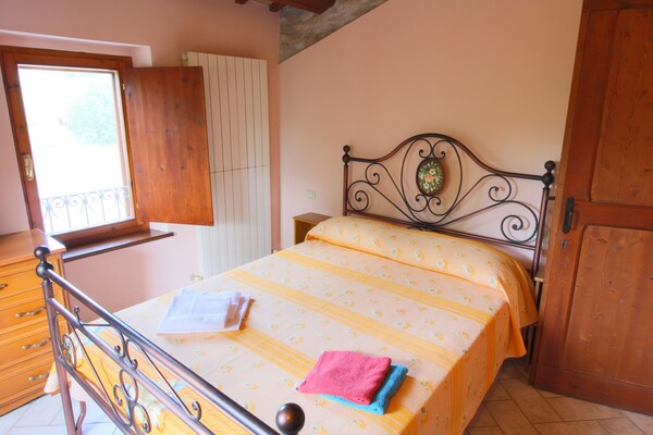Foto van Volledige boerderij met onafhankelijke appartementen en zwembad - BedRoom